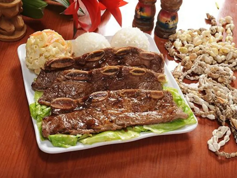 Marinated kalbi short ribs plate with rice and mac salad at AHI Hawaiian BBQ, a Hawaiian Restaurant in Palmdale