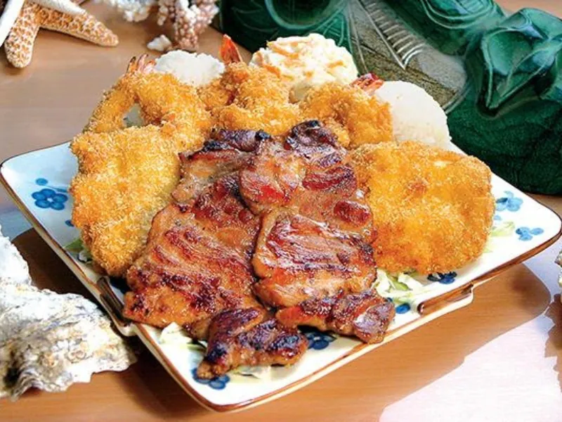 A seafood and BBQ plate with shrimp, chicken, and rice at AHI Hawaiian BBQ, a Hawaiian Restaurant in Palmdale